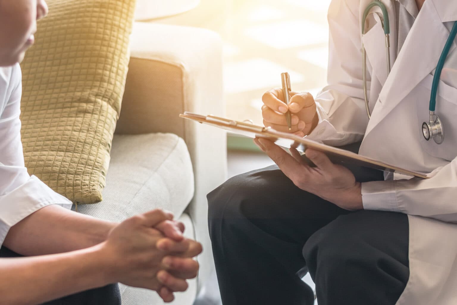 Doctor explaining long covid symptoms to patient